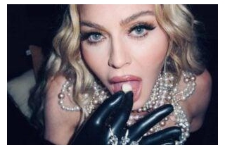 Madonna Poses In Leather Corset And Fishnets Wowing Fans With Her Ageless Beauty