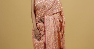 Exploring The Splendor Of Peachish Pink: Tissue Cotton Cutwork Jamdani Saree