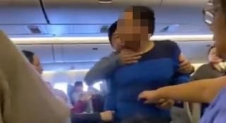 Seat Dispute Sparks Violent Altercation On EVA Air, Watch Viral Video