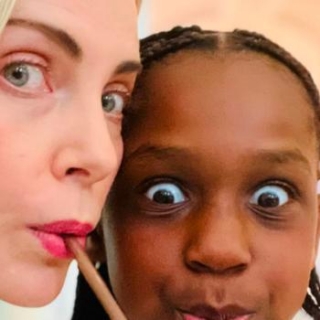 CHARLIZE THERON AND DAUGHTER AUGUST ENJOY NYC AND DIOR FASHION SHOW