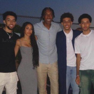 SCOTTIE PIPPEN AND LARSA PIPPEN SUPPORT SON, JUSTIN, AT HIS HIGH SCHOOL GRADUATION