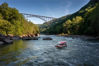 Boat Tours Transport Sightseers To View Of New River Gorge Bridge