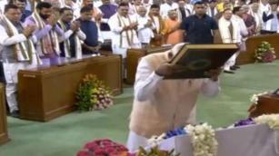 Narendra Modi Touches Constitution Book To Forehead During NDA Meeting At Samvidhan Sadan