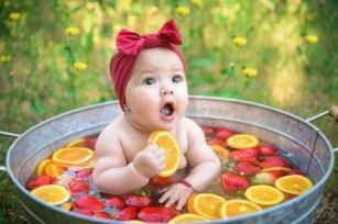 Enchanting Moments: Celebrating Childhood’s Joy And Innocence With Floral Bath Time Photography