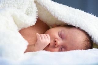 10 Ways To Get Your Newborn To Sleep Through The Night