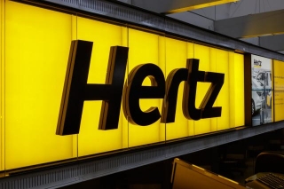 Hertz CEO Exits As EV Transition Costs Hit $245 Million, Sparking Industry Caution