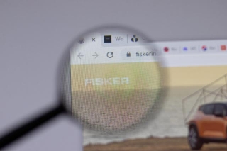 EV Startup Fisker Seeks $150M Lifeline, Halts Production Amid Market Turbulence