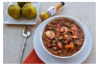 How To Make Caribbean-Inspired Lobster And Rice Stew