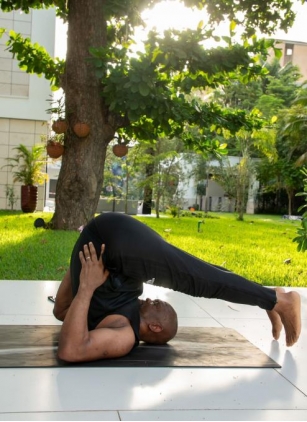 Photos: Tony Elumelu’s Yoga Session Causes Stir On Twitter, Nigerians React