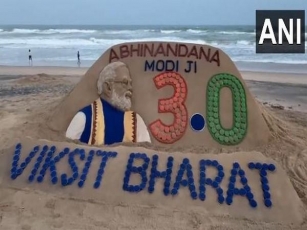 Artist Sudarsan Pattnaik Creates Sand Sculpture Of Narendra Modi At Puri Beach Ahead Of Swearing-in Ceremony