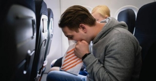 Passenger Left Bewildered After Spotting Couple Cozying Up Together On Flight