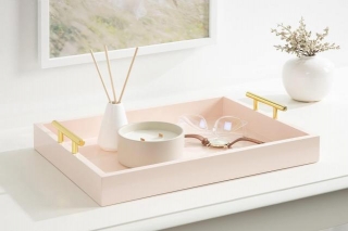 Add Glamour To Your Space: The Pink Decorative Tray With Polished Gold Metal Handles.