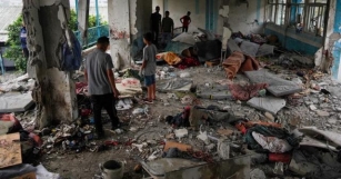 Photos: Israel Attacks UN-run School In Central Gaza, Killing 40