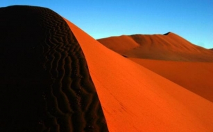Sossusvlei: Unveiling The Rust-Colored Dunes Of Namibia's Desert Wonderland