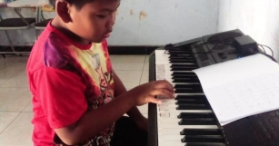 Mengapa Les Piano Di Usia Dini Penting Untuk Anak SD Kelas 2?