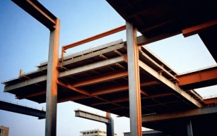 How Does Material Selection Impact the Design of Cantilever Beams?