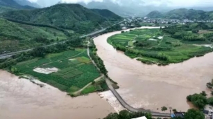Thousands Evacuated As Floods Hit Southeast China