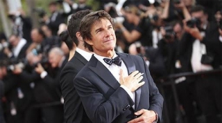 Tom Cruise Rescue's As Photographer Falls At Victoria Beckham's Event