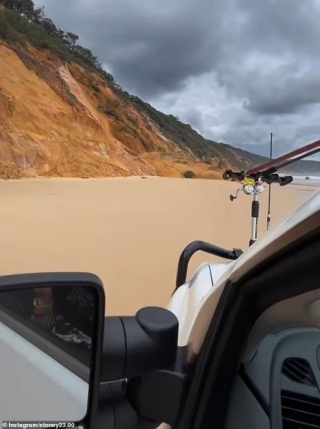 Double Island Point: Heartstopping Moment Beachgoers Narrowly Escape A Landslide That Comes With Metres Of Their 4WD