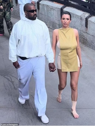 Kanye West Sheds His Usual All-black Look For White Sweats While Wife Bianca Censori Goes BAREFOOT As They Join The Crowds For Disneyland Visit