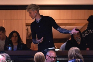 Machine Gun Kelly Rocks Up At Iowa Vs UConn As The American Rapper Watches Caitlin Clark Take On Paige Bueckers In His Hometown Of Cleveland Following Megan Fox Split