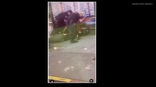 EXCLUSIVE: Video Shows Seattle Police Officers Beating Man With Batons At Bus Stop