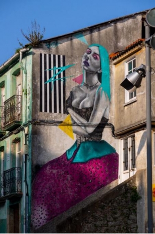 The Urban Art Neighborhood That Hides Hundreds Of Meninas