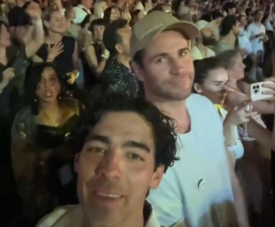 Liam Hemsworth, Kylie Minogue, Joe Jonas, Luke Evans, And More Enjoy Coldplay Concert Together In Greece