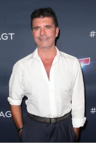 Simon Cowell Credits Son For Saving Him From “Downward Spiral”