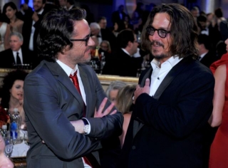Johnny Depp Celebrated Robert Downey Jr.’s Oscar Win By Accidentally Sharing A Bizarrely Photoshopped Picture