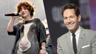 Claud Got A Shoutout From Paul Rudd On ‘Colbert’ As He Told The Story Of His Funny Appearance In Their Video