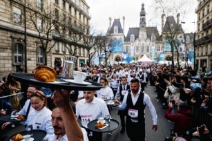 Paris Waiters Race Through The Streets As French Capital Celebrates The City’s Life And Soul Ahead Of Olympics