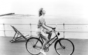 Fascinating Photos Of Emily Lloyd Cycling In “Wish You Were Here” (1987)