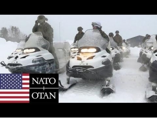 US Marines On Snowmobiles During Winter Exercises In Norway, NATO.